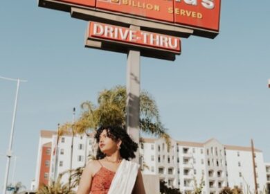 Mythily Nair picture with McDonald's sign