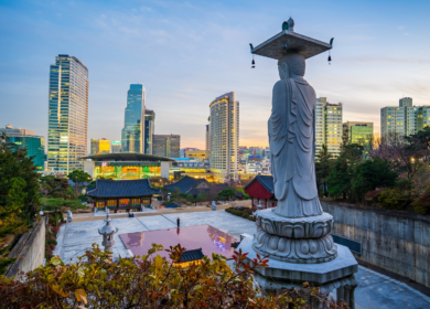 Statue in front of skyline