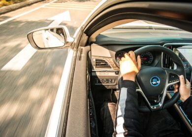 Car driving down road